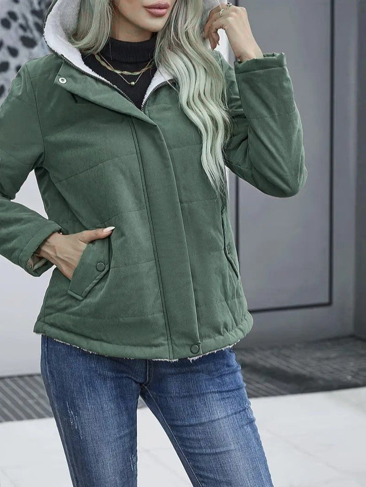 Women's insulated hooded jacket, full zip, providing superior warmth for winter.