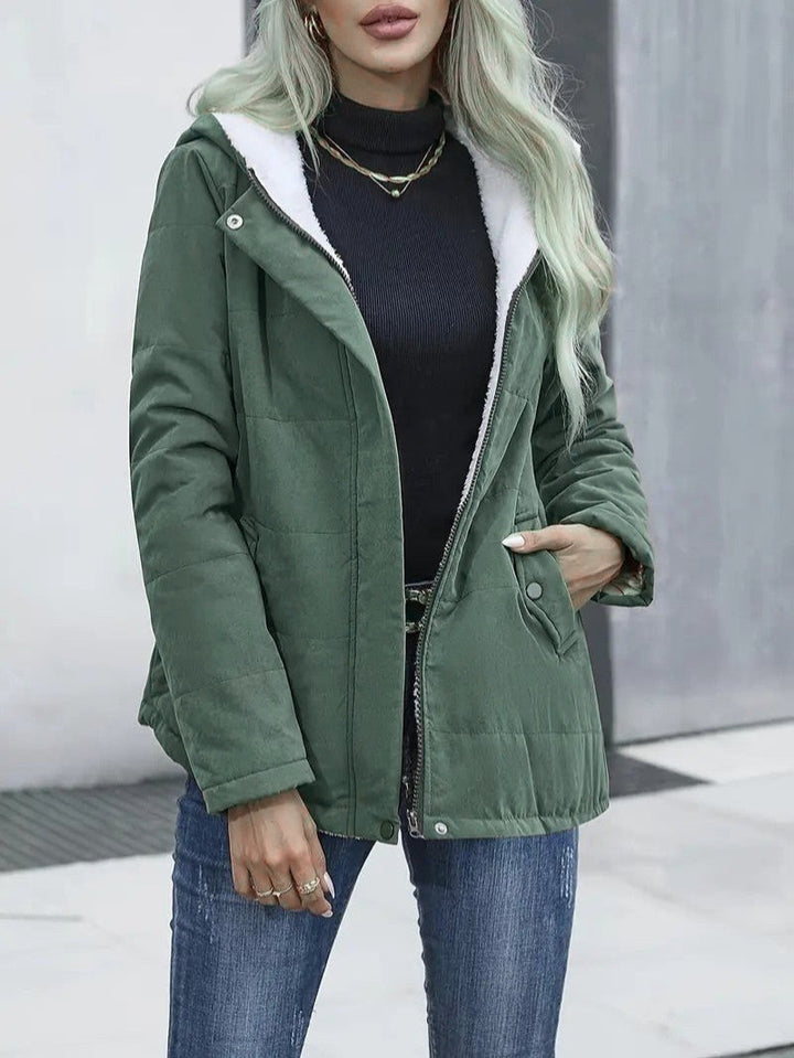 Women's lightweight yet warm hooded winter jacket, zip-front for easy wear.