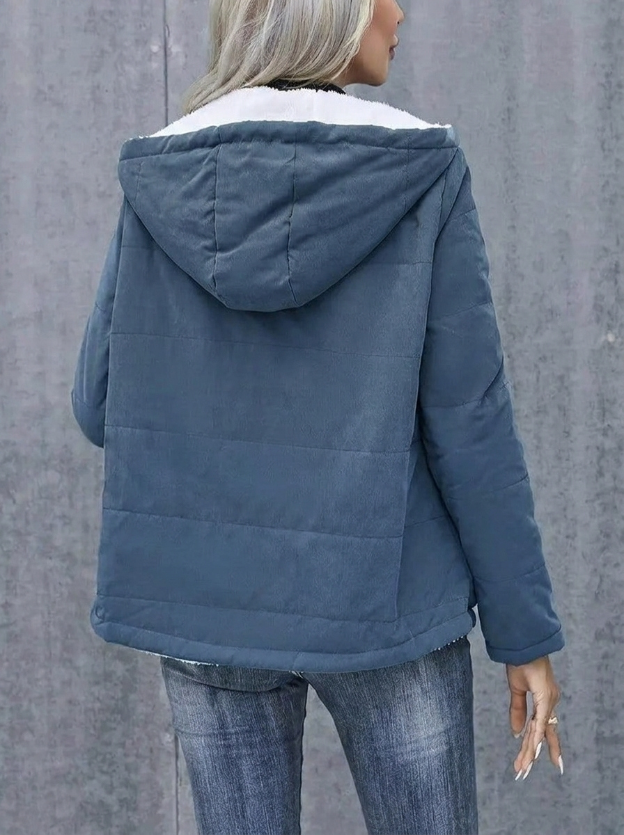 Warm women's winter puffer jacket with hood, front zip closure, essential for cold.