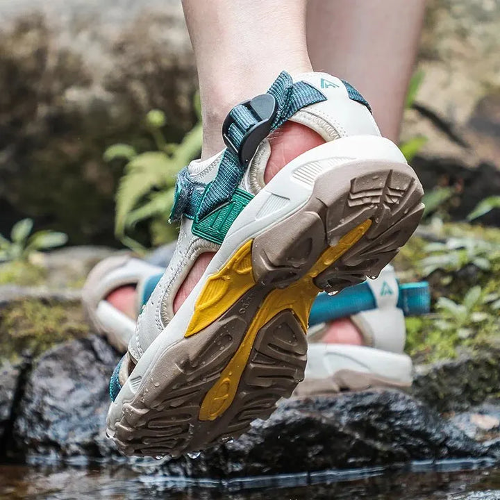 Durable women's outdoor water sandals with supportive arch & non-slip traction for walking & hikes.