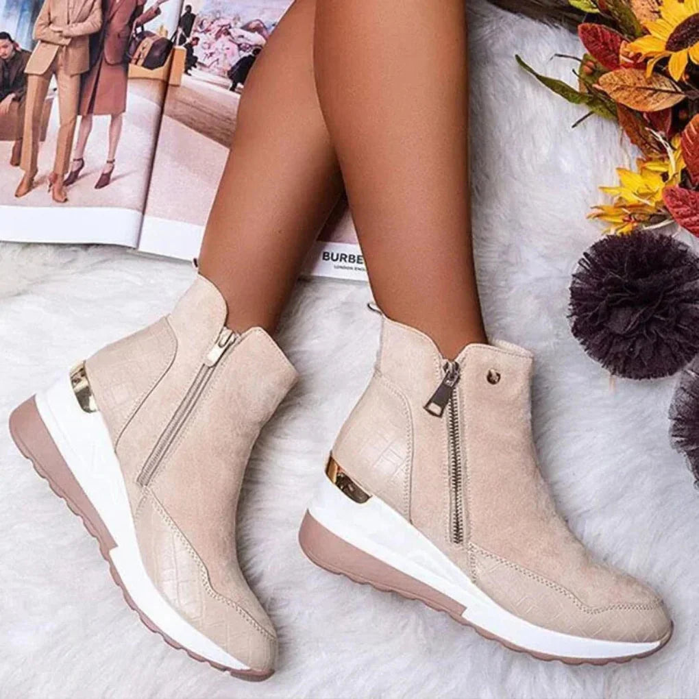 Stylish women's waterproof ankle boots with double zippers for easy wear. Comfortable and durable with slip-resistant soles.