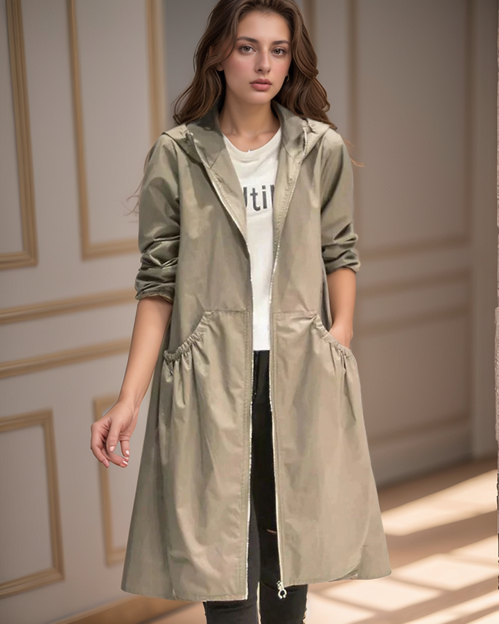 Women's waterproof hooded rain jacket, knee length & relaxed fit, ideal for all-weather outerwear.