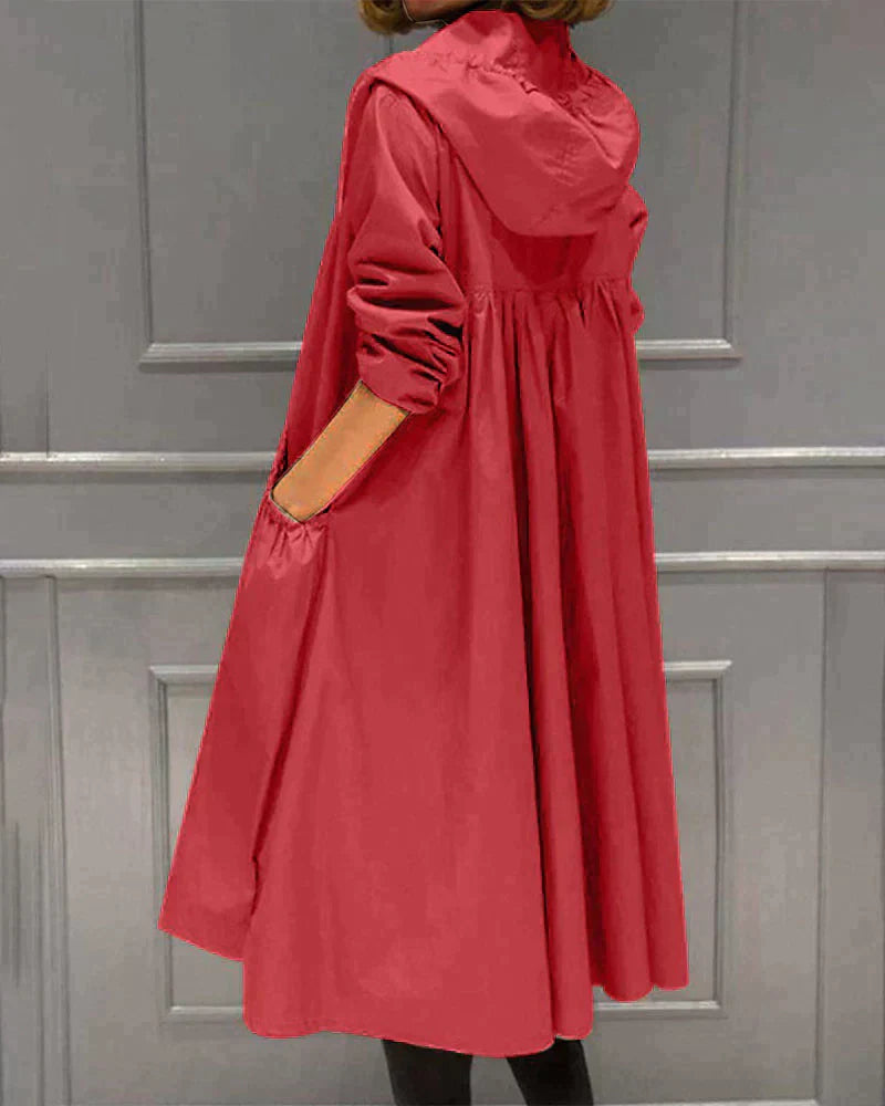 Durable women's waterproof jacket, hooded & relaxed fit, excellent for daily wear or travel in rain.