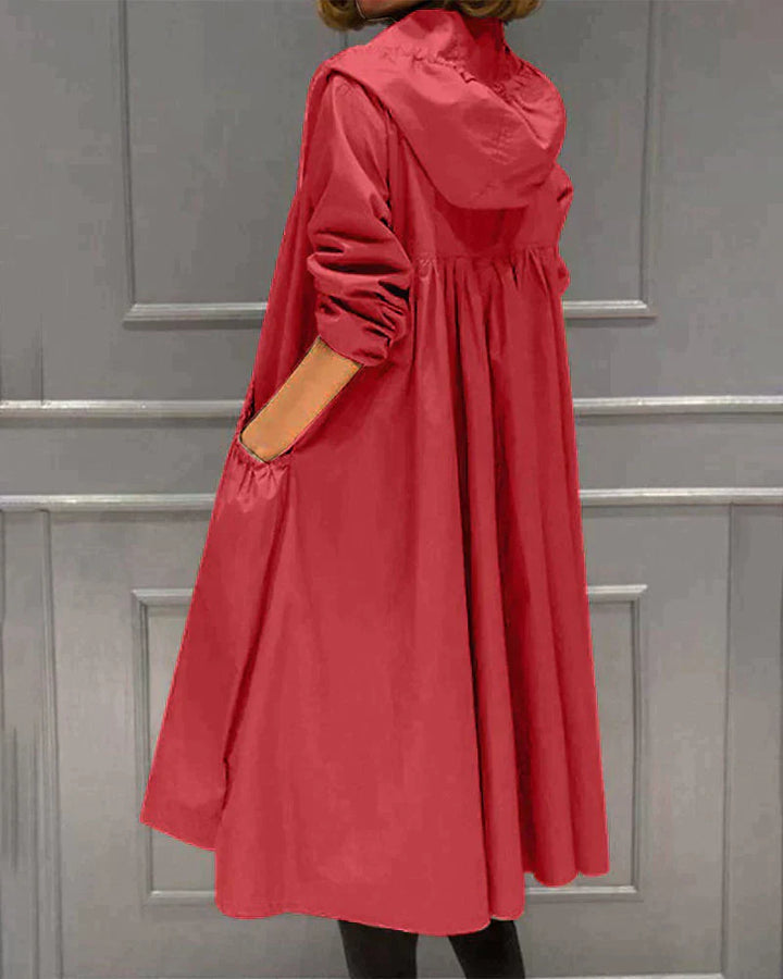 Durable women's waterproof jacket, hooded & relaxed fit, excellent for daily wear or travel in rain.