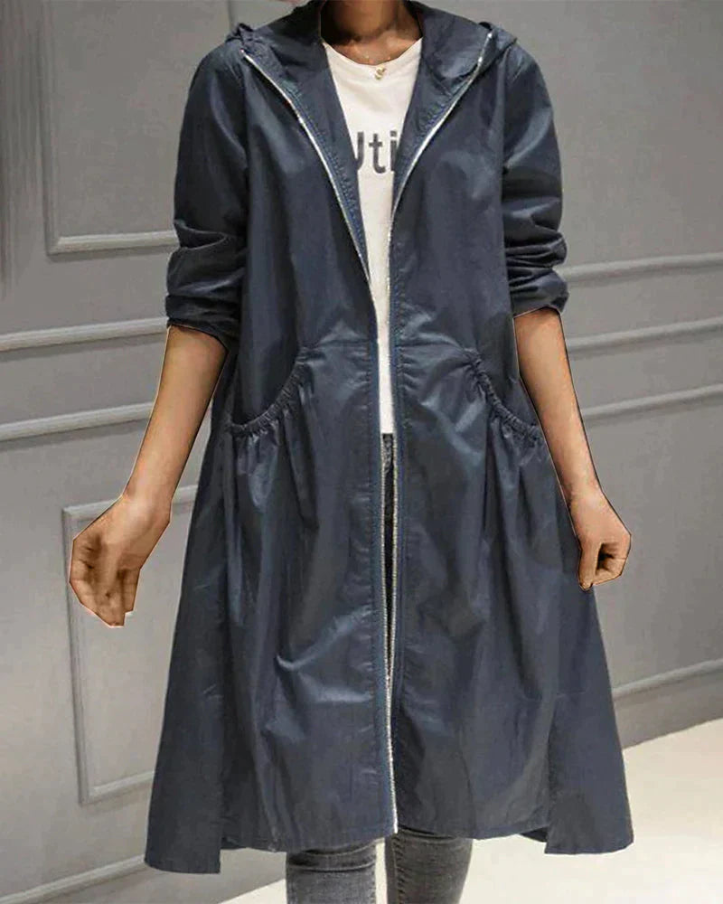 Practical women's all-weather rain jacket, knee-length with an adjustable hood & relaxed silhouette.