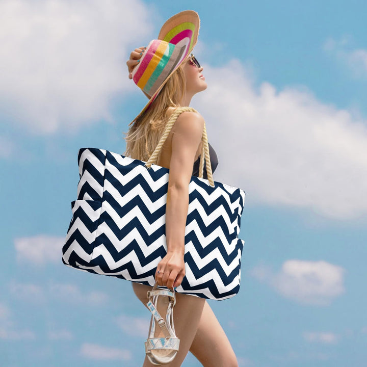 Hard-wearing women's waterproof large tote, featuring convenient zipped storage & shoulder straps.