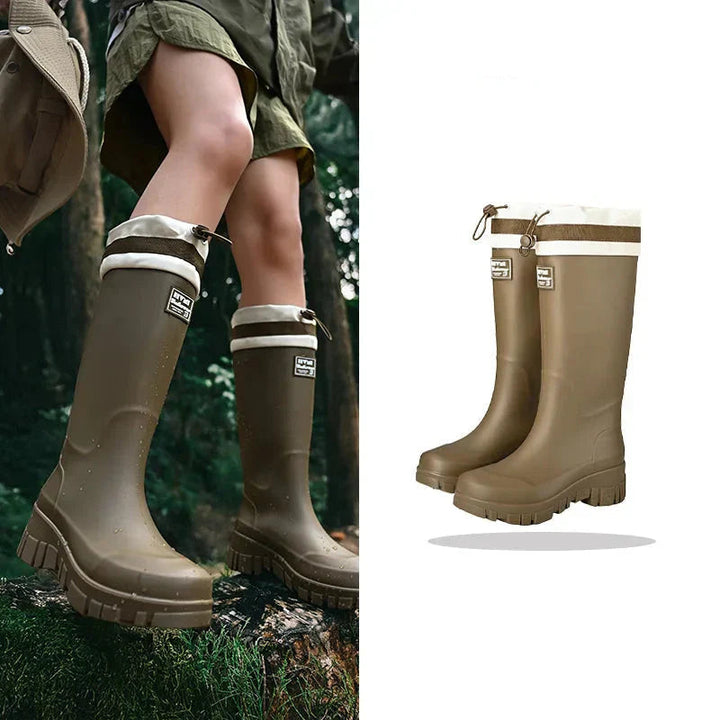 Women's durable high rain boots, waterproof for ultimate comfort in outdoor gardening.
