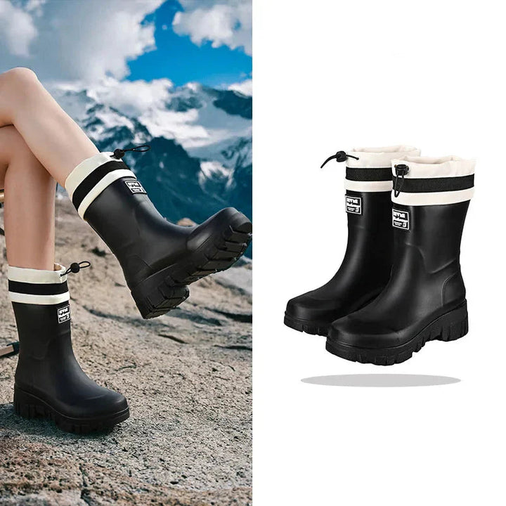 Easy slip-on women's waterproof rain boots, excellent for muddy gardens & wet outdoor adventures.