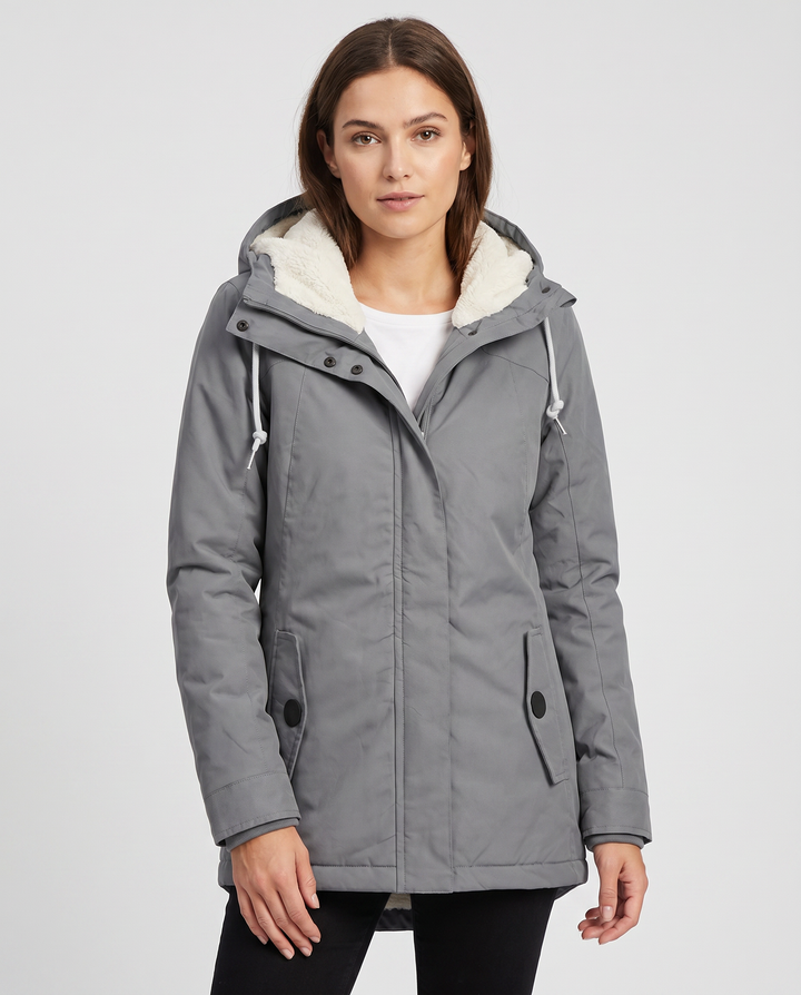 Stylish women's hooded waterproof rain jacket, perfect outerwear for all-weather comfort.