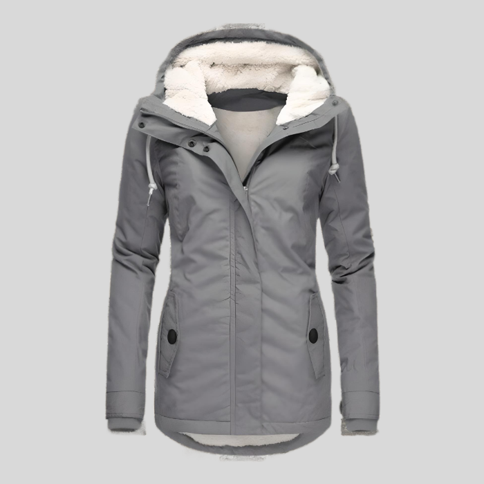 Durable women's hooded waterproof rain jacket, essential all-weather outerwear piece.