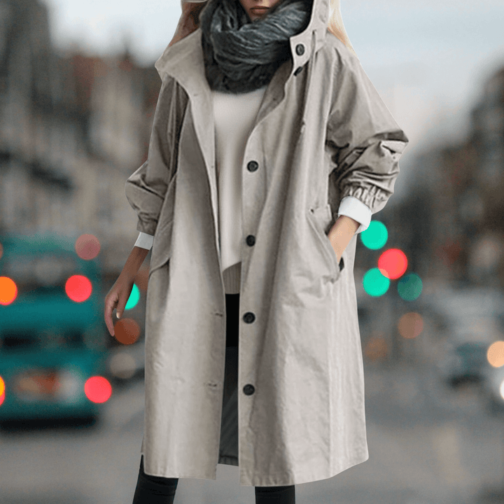 Women's waterproof trench coat with cozy teddy lining, perfect for stylish fall and winter outerwear.