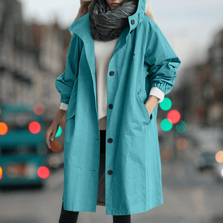 Stylish women's waterproof trench coat featuring a soft teddy lining, ideal fall and winter jacket.