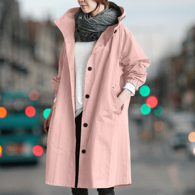 Plush teddy lined women's waterproof trench coat, ensuring warmth and protection against rain and cold.