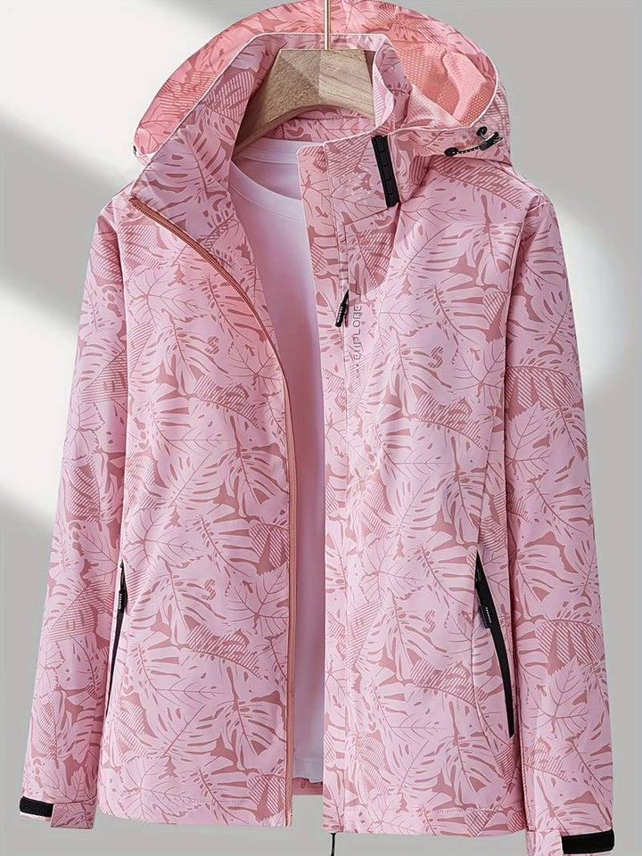 Stylish women's grey hooded jacket, offering waterproof & windproof protection for outdoor adventures.