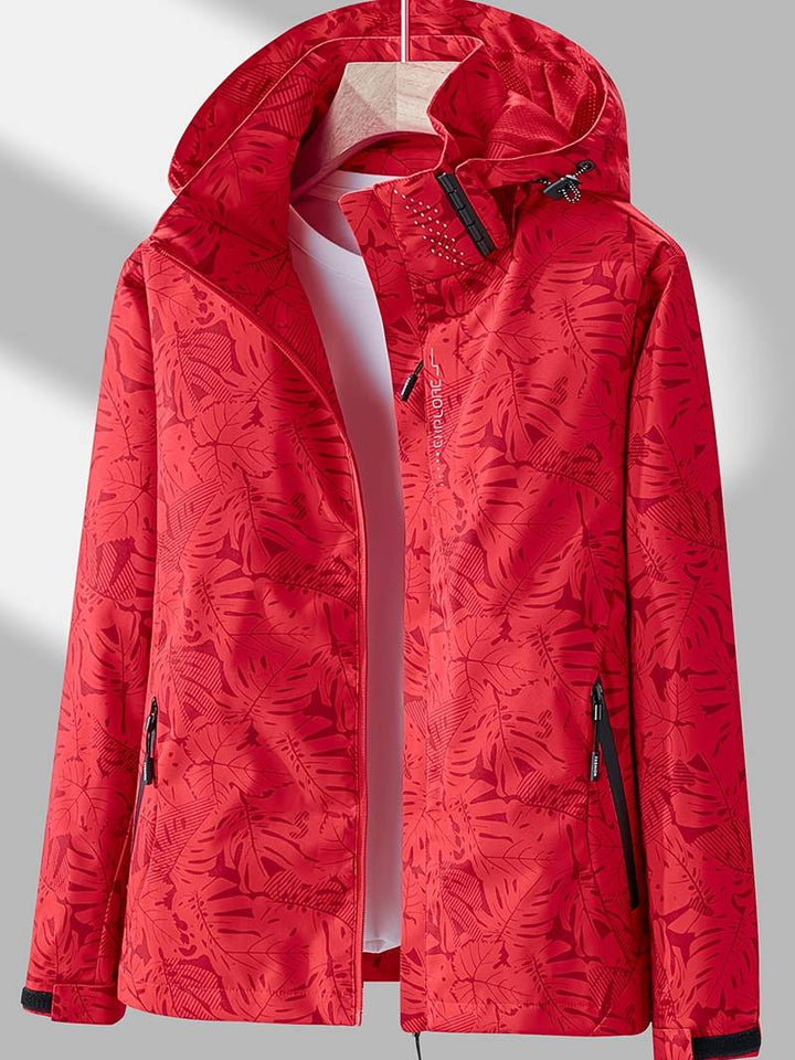 Versatile women's hooded rain jacket for spring & fall, offering windproof protection and casual wear.