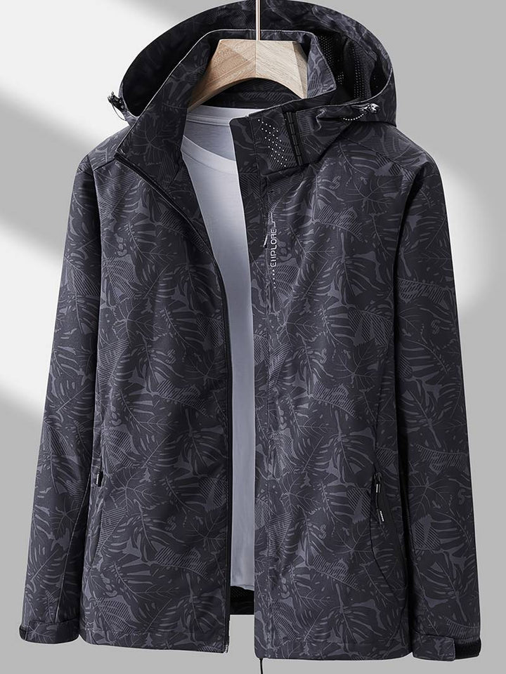 Comfortable women's lightweight waterproof jacket with adjustable hood, perfect for everyday outerwear.