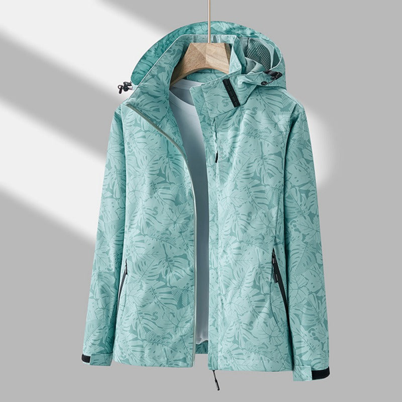 Durable women's waterproof windproof jacket for hiking & travel, ensures protection in all weather.