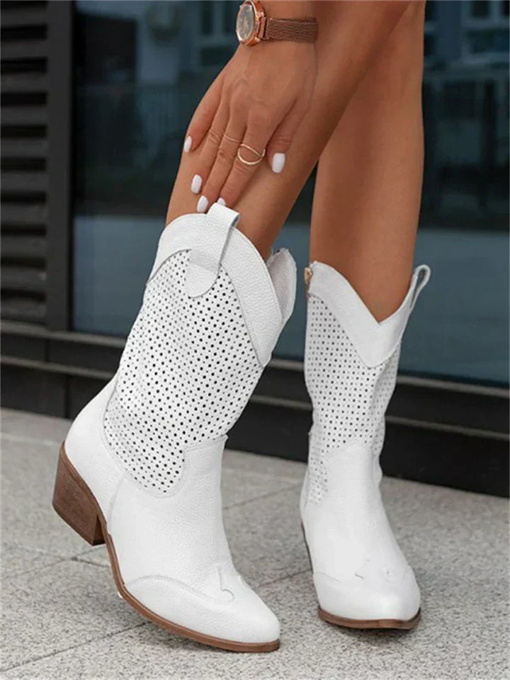 Women's Western ankle boots with pointed toe and sturdy block heel, perfect for casual chic style.