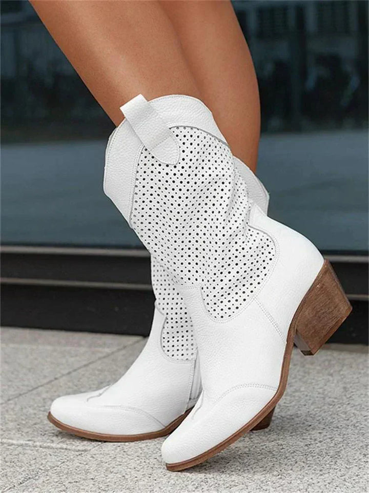 Chic women's pull-on Western ankle boots with a stylish pointed toe and stable block heel for transitional wear.