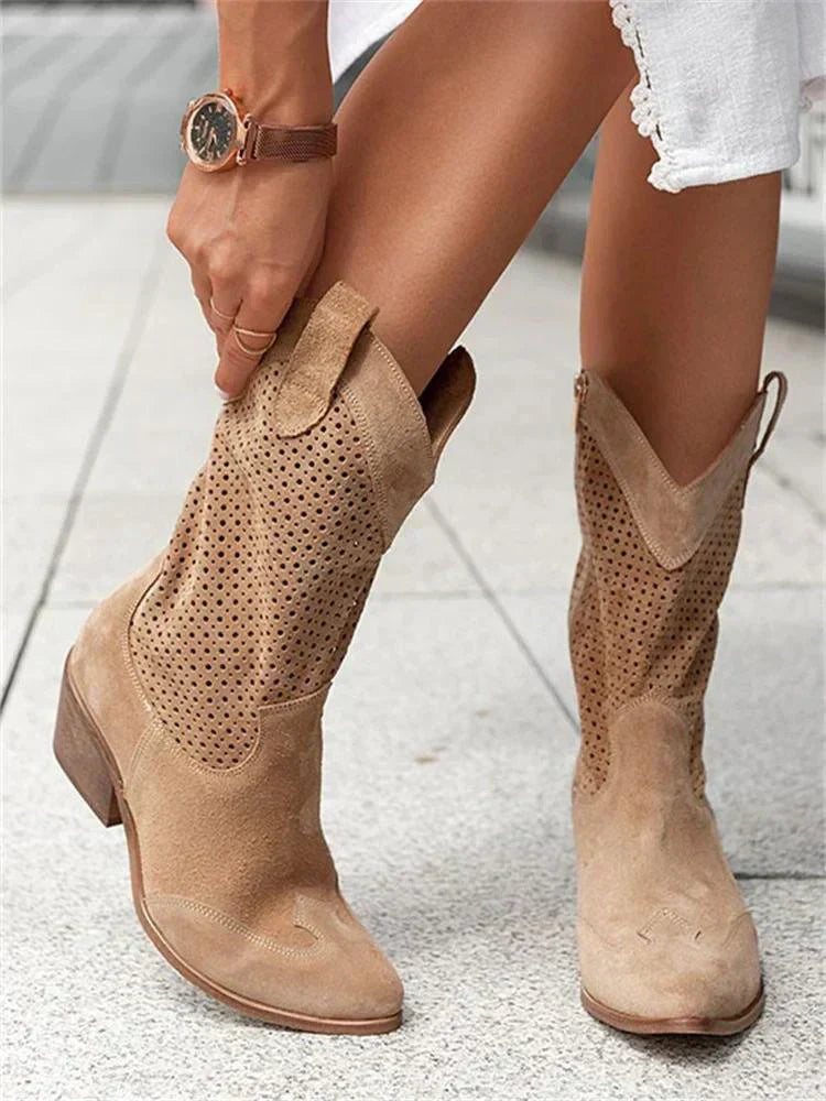 Women's fashionable faux leather Western ankle boots, pointed toe, block heel, ideal for casual outfits.