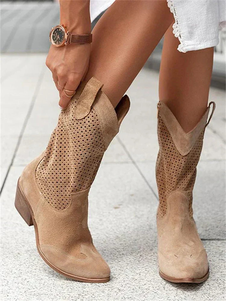 Women's fashionable faux leather Western ankle boots, pointed toe, block heel, ideal for casual outfits.