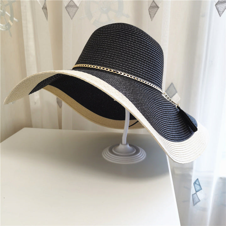 Breathable women's travel sun hat with wide brim & UV protection, ideal for vacations & summer adventures.