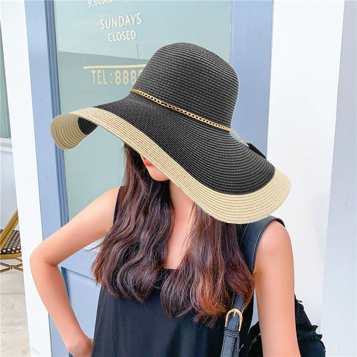 Fashionable women's wide brim hat offering sun & UV protection for beach, travel, and everyday wear.