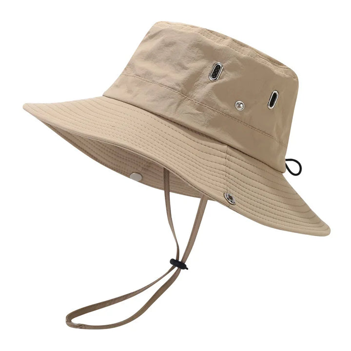 Breathable mesh women's sun hat with wide brim for superior UV protection. An essential travel hat for outdoor sports.