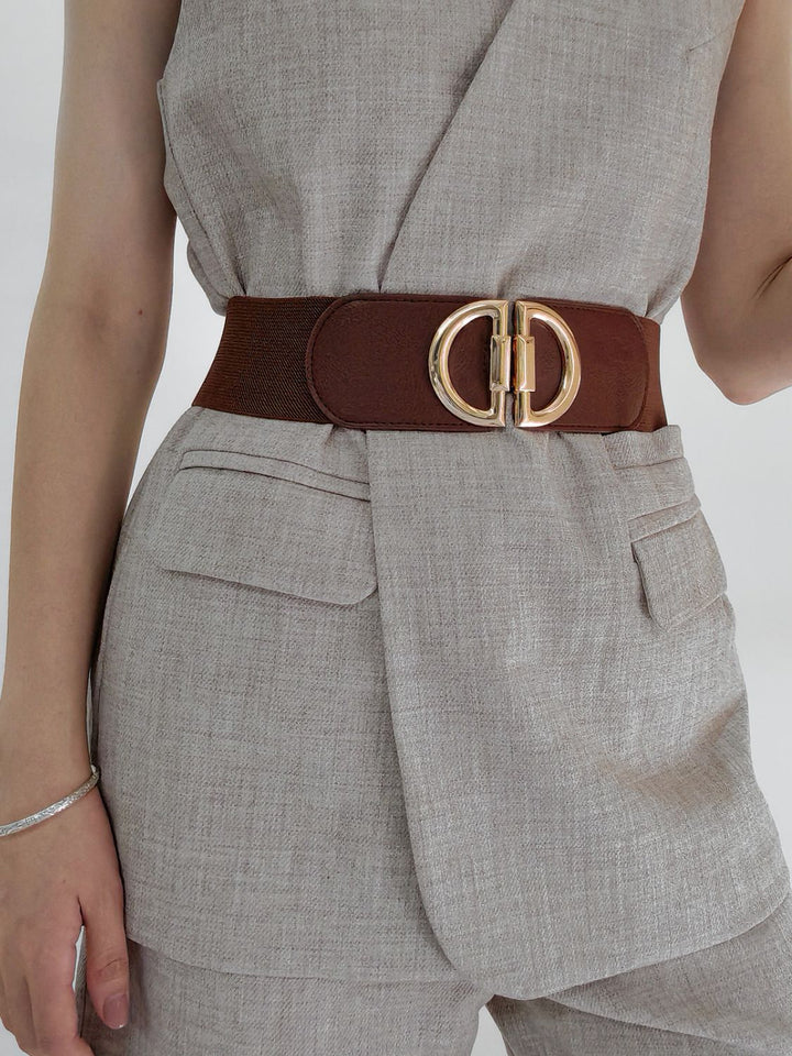 Women's wide elastic waist belt with stylish gold buckle for dresses and tunics.