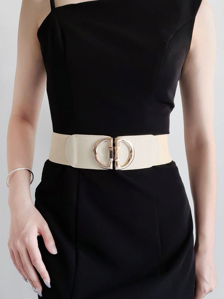 Essential women's wide elastic waist belt with a stylish gold buckle, a must-have accessory.