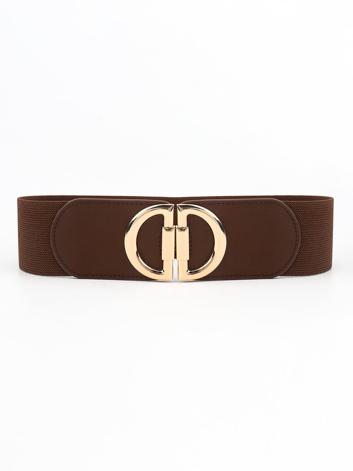 Fashionable women's wide waist belt with a distinctive gold buckle, an elegant accessory.
