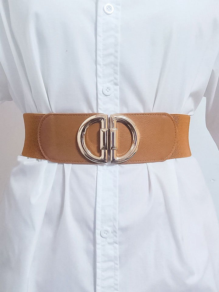 Women's wide elastic cincher belt, accentuating the waist with a stylish gold buckle.