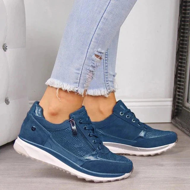 Supportive women's wide fit running shoes for walking & an active lifestyle. Stylish and comfortable athletic footwear.