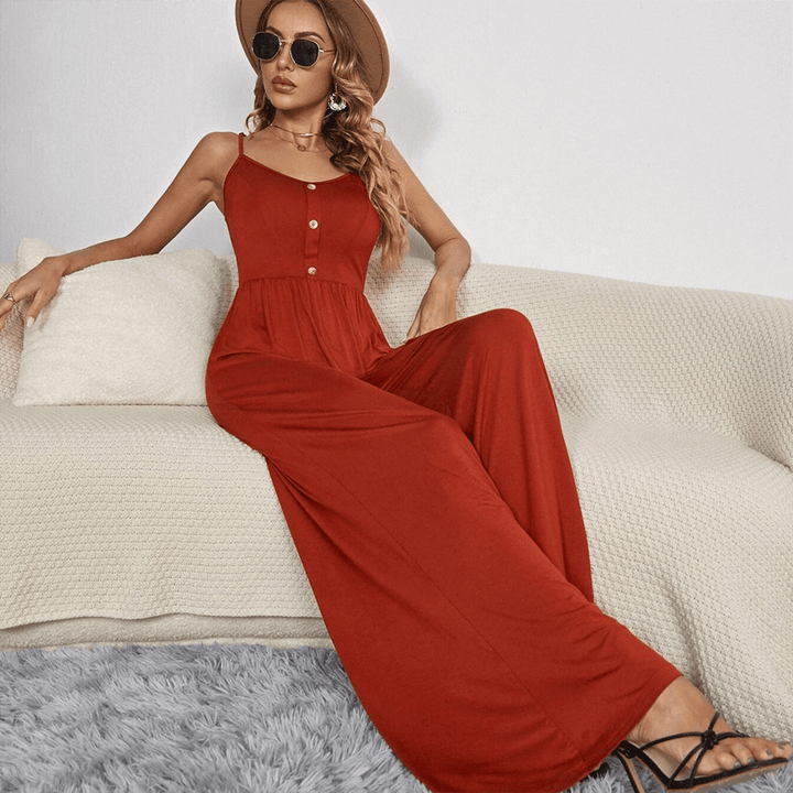 Versatile women's one-piece wide leg jumpsuit. Button front detail, spaghetti straps for summer fashion.