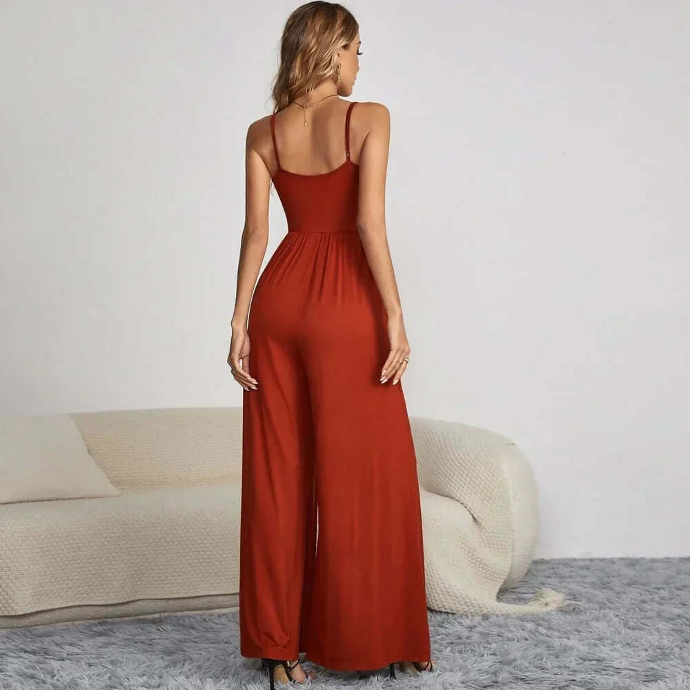 Elegant women's wide leg button front jumpsuit. A comfortable, versatile one-piece with spaghetti straps for summer.