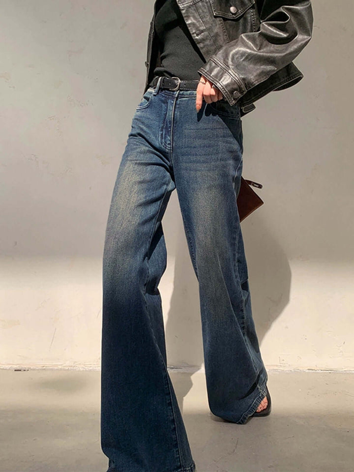 Stylish women's high-waisted wide leg vintage denim jeans. Classic blue wash, comfortable & flattering fit.