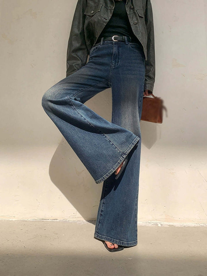 Blue vintage wide leg jeans for women. High-waisted design offers a flattering fit for spring & fall fashion.