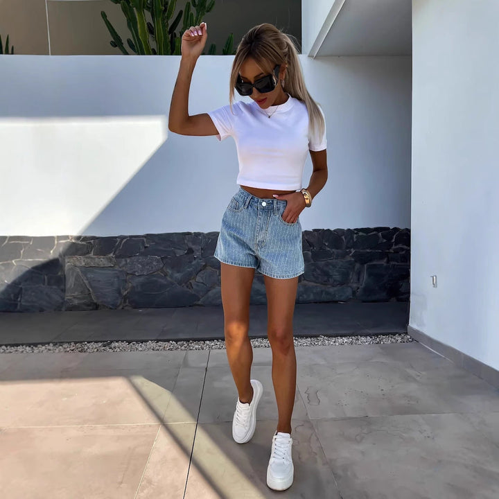 Chic women's wide leg striped jorts. Relaxed fit denim shorts for comfortable, modern summer outfits.