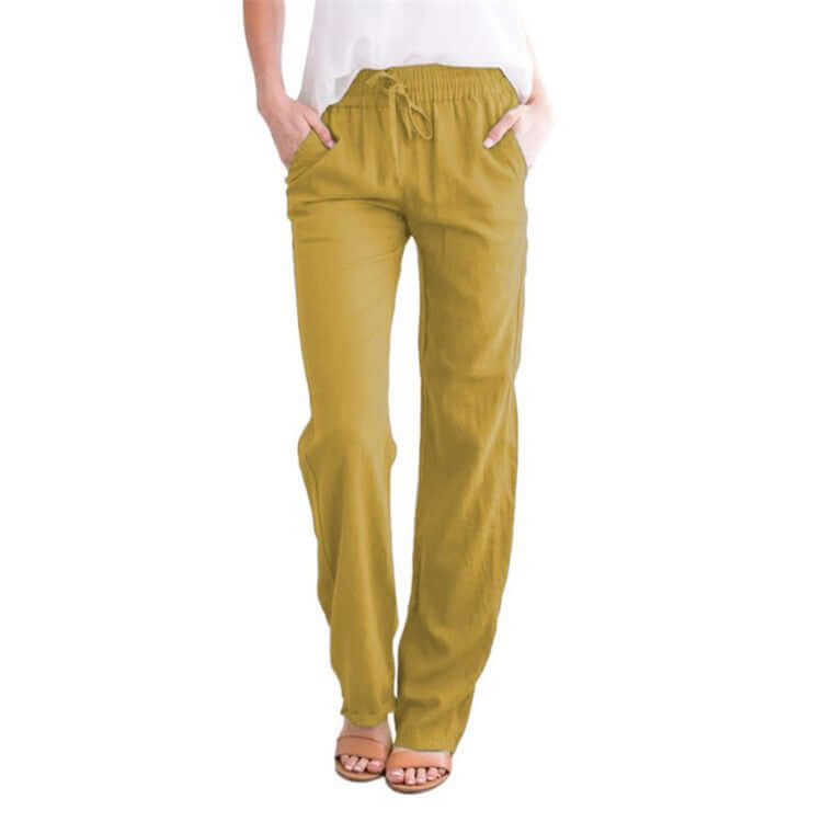 Back view: Women's breathable linen-cotton wide-leg pants, showing their loose, elegant drape.
