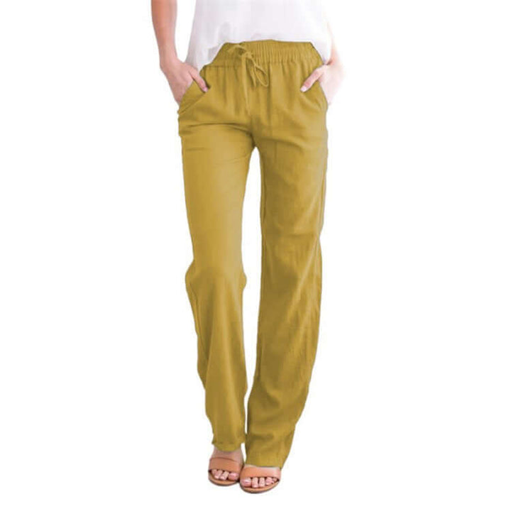 Back view: Women's breathable linen-cotton wide-leg pants, showing their loose, elegant drape.