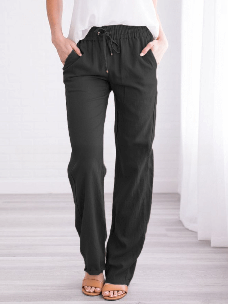 Side view: Women's stylish wide-leg drawstring pants in a soft, breathable linen-cotton blend.