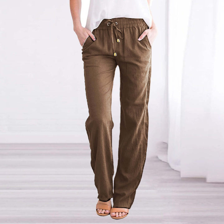 Texture of women's linen-cotton wide-leg drawstring pants, emphasizing the lightweight, breathable fabric.