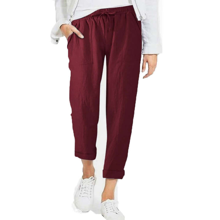 Women's loose-fit linen-cotton wide-leg drawstring pants, offering relaxed comfort & breathable style.