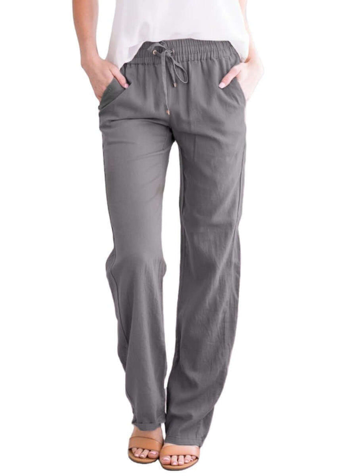 Elegant women's loose-fit wide-leg linen-cotton pants featuring a comfortable drawstring waist.