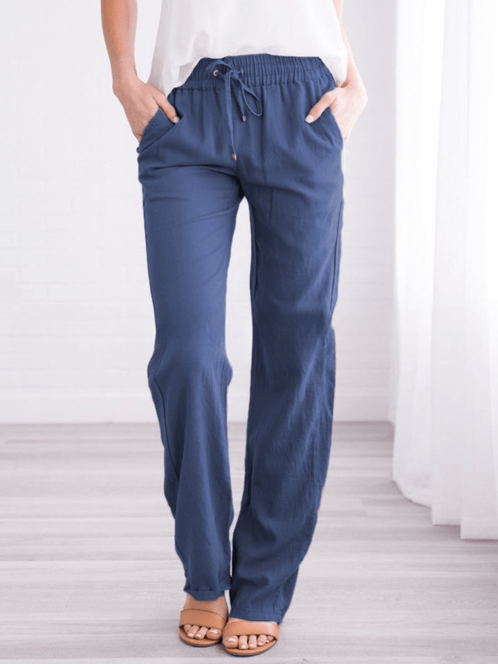 Casual women's wide-leg linen-cotton pants with drawstring, designed for ultimate spring/summer comfort.