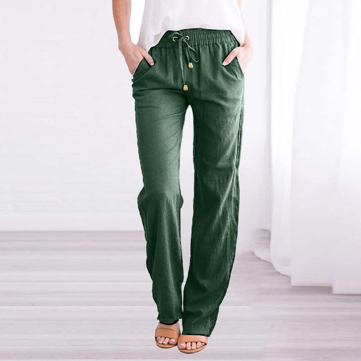 Model in women's wide-leg linen-cotton drawstring pants, highlighting their relaxed, comfortable fit.