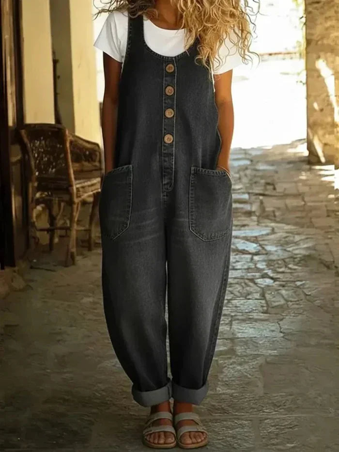 Relaxed fit women's wide leg overalls with button-front and practical pockets, offering effortless casual style.