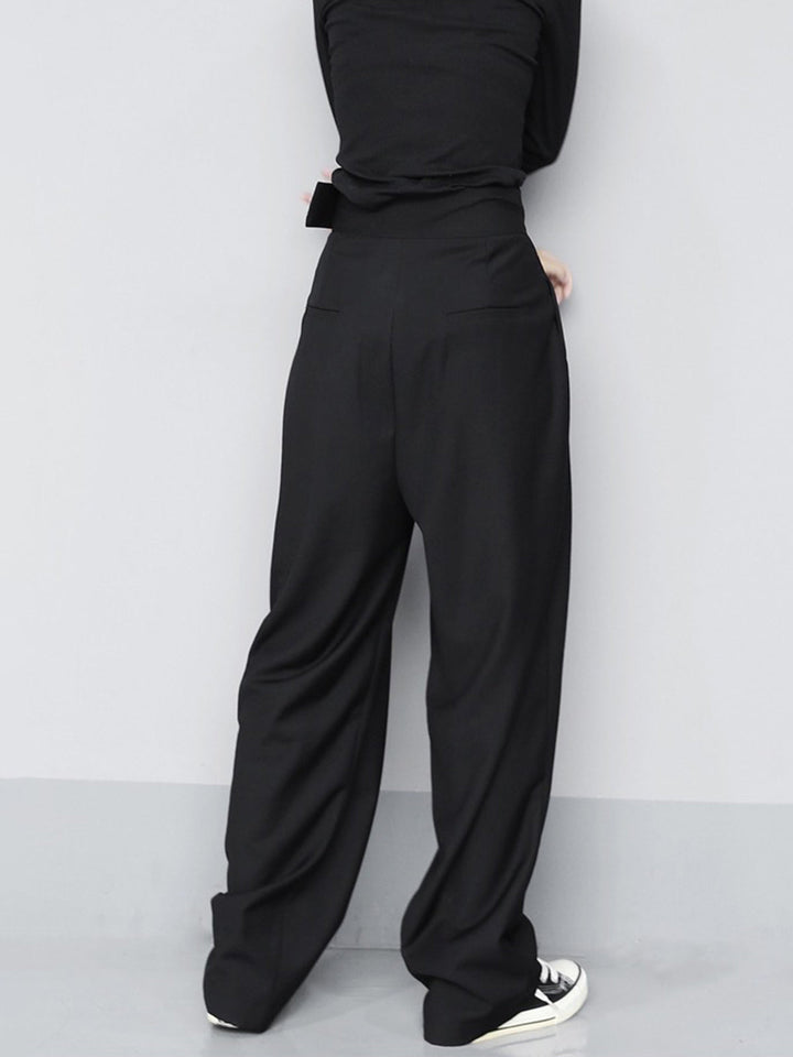 Comfortable women's wide leg trousers with modern pleated design and easy Velcro waist for daily wear.