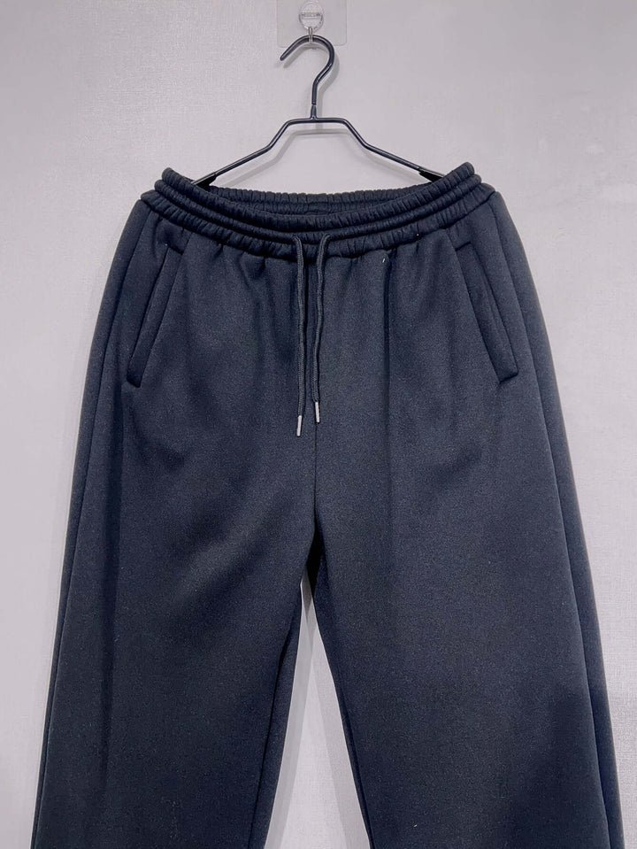 Cozy wide-leg women's sweatpants, elastic waist, perfect for fall & winter comfort and style.