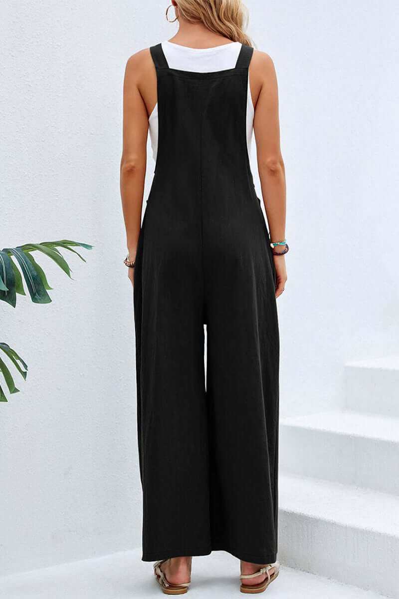 Solid color women's wide neck spaghetti strap jumpsuit, elegant and relaxed fit apparel.